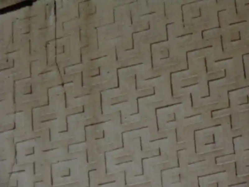 Cross design covering the facade of the Midas monument